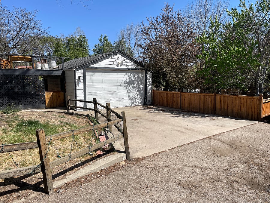 One private parking space in front of garage