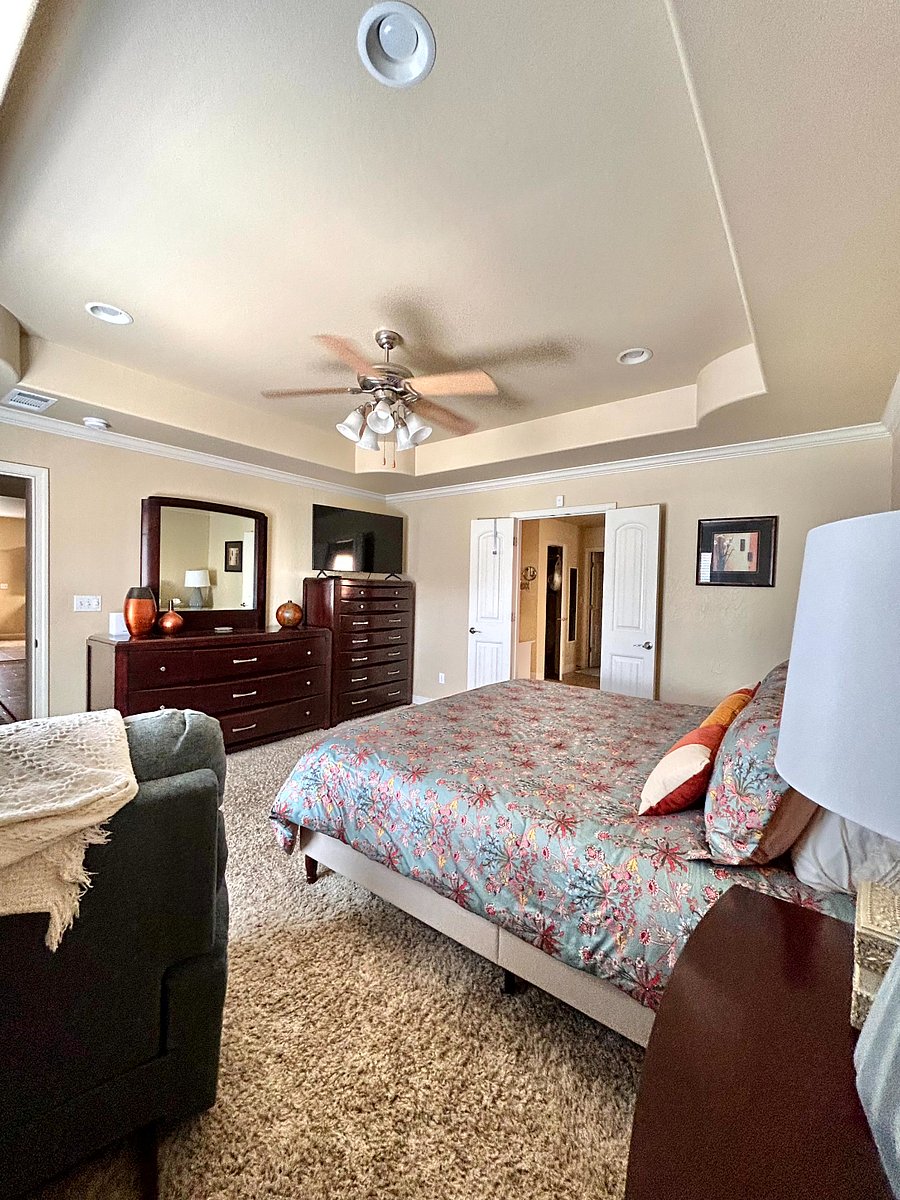 Primary Bedroom with King Bed and 65" Smart TV
