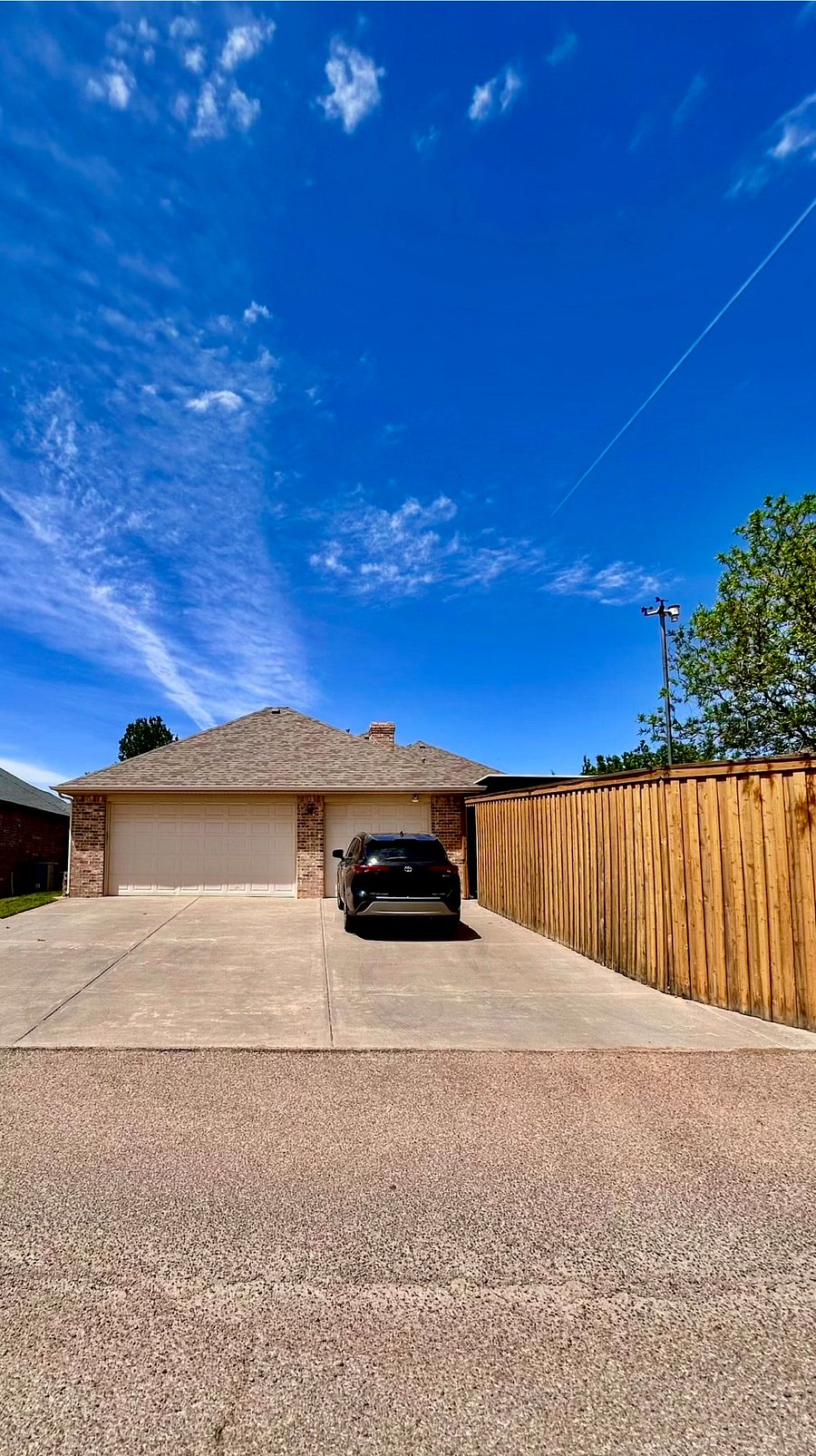 3 Car Garage with Alley Entry