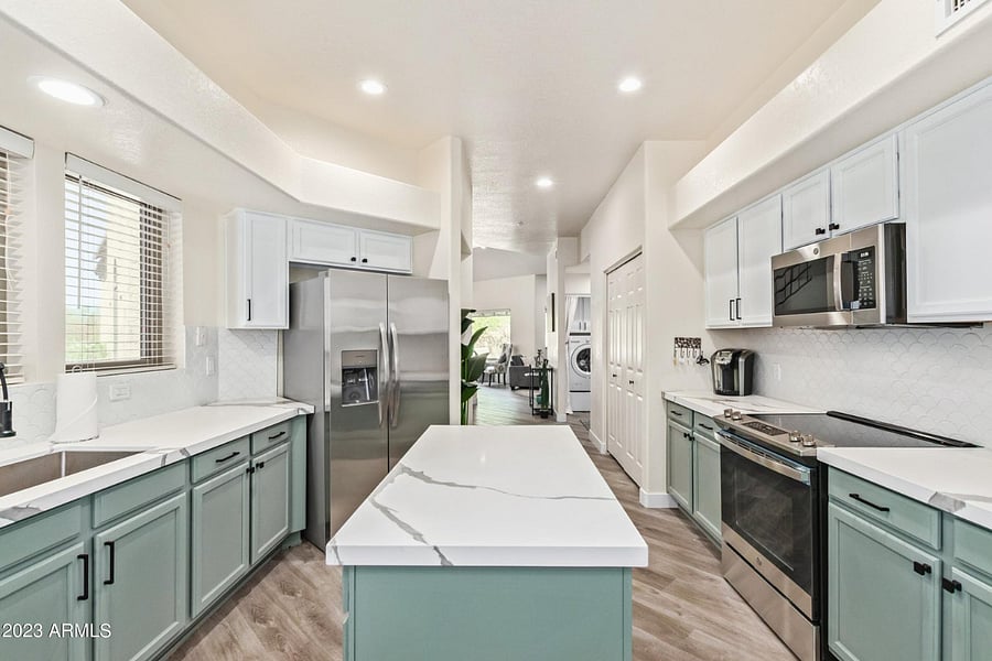 Remodeled kitchen, New refrigerator, oven, range, microwave, front loader washer/dryer.