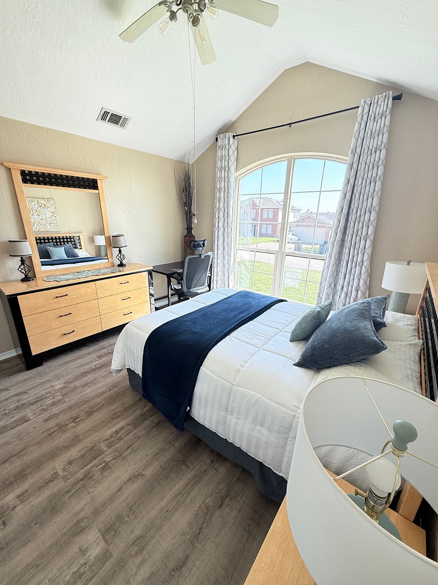 Room for Rent.  Large window with room darkening shades.  Office desk and chair.