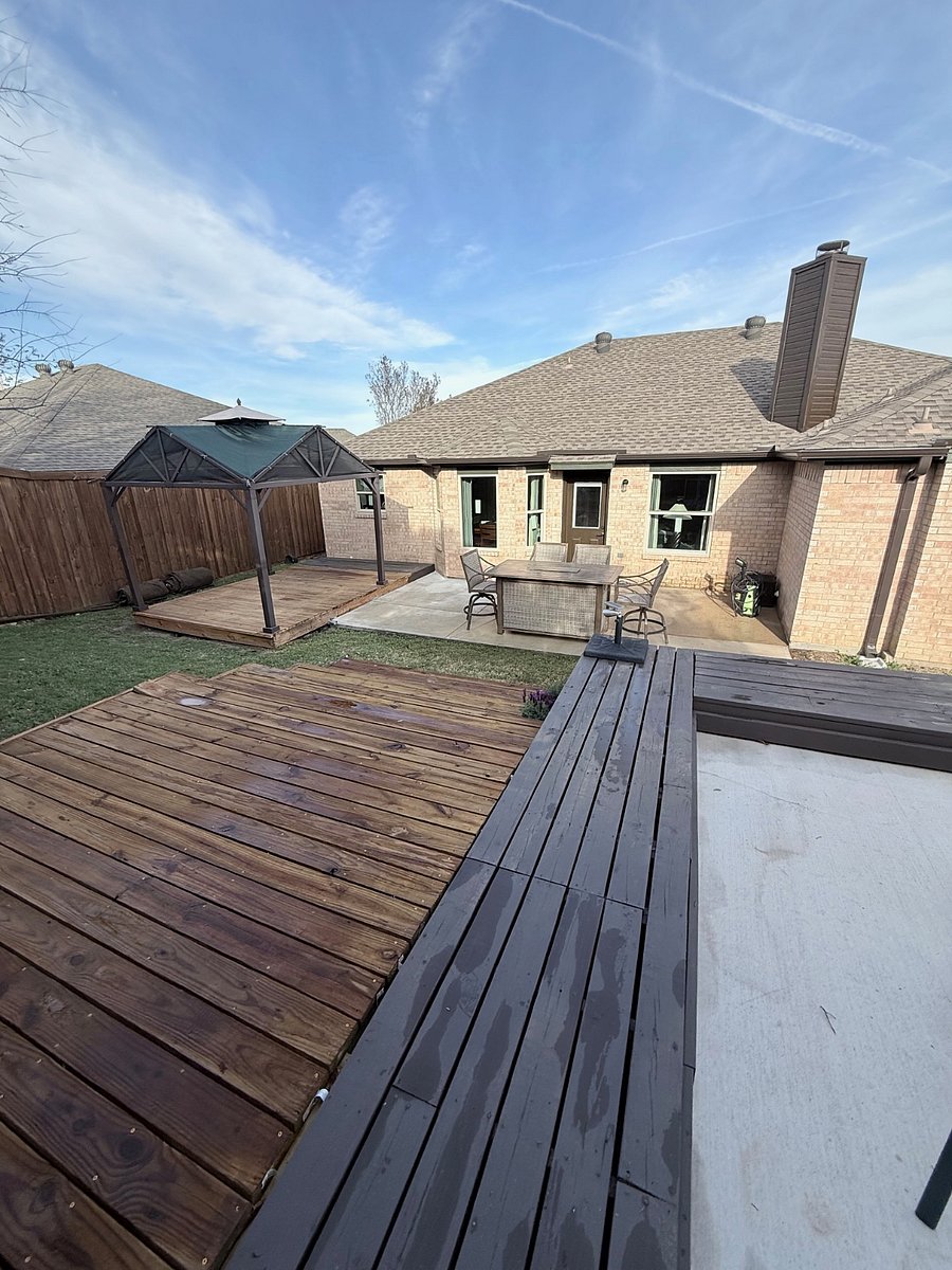 More of the backyard, looking at the back of the house. 