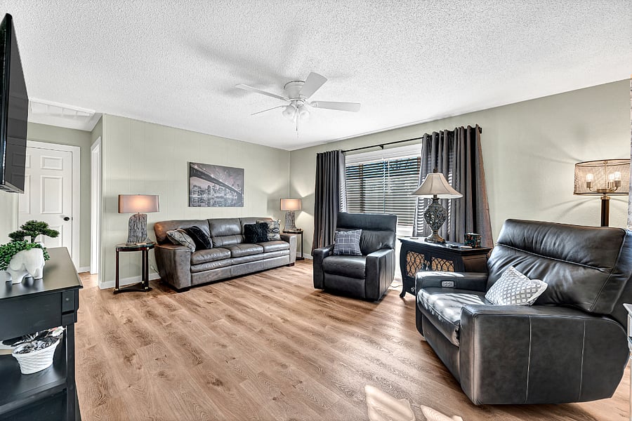 Leather sofa is great, room darkening shades also.