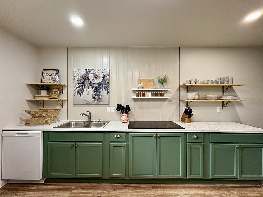 Fully stocked kitchen with spices, coffee maker, and a 3-in-1 microwave, air fryer, and concention oven