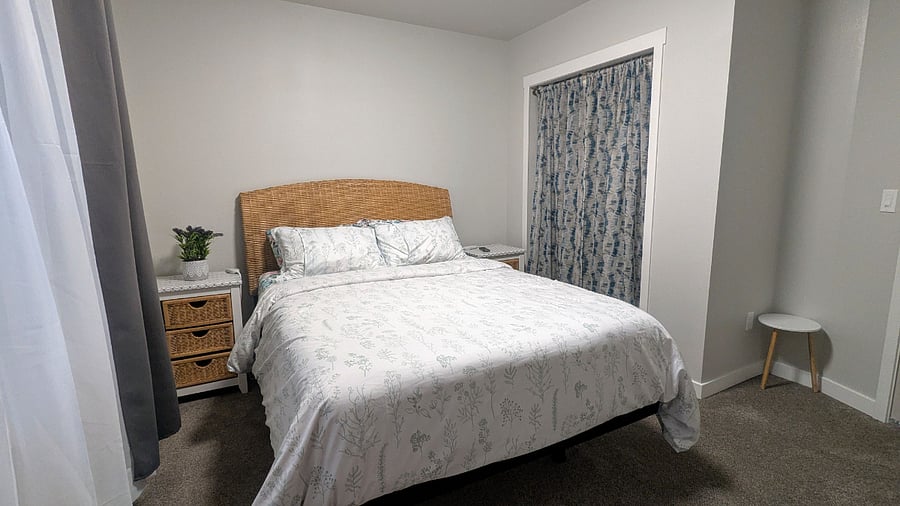 Queen bed on an adjustable base with a warmer and massager