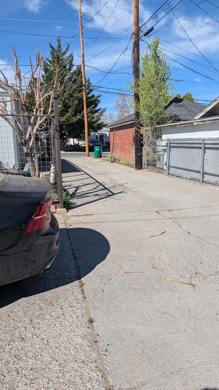 This is the alley heading onto Plumas Street. So this is heading west from the garage apartment. The parking space in front of the garage is parking for the main house tenant. You can see the back of the car.