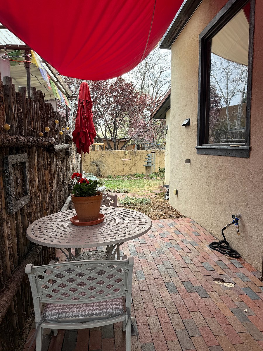 Patio with comfortable aluminum furniture.