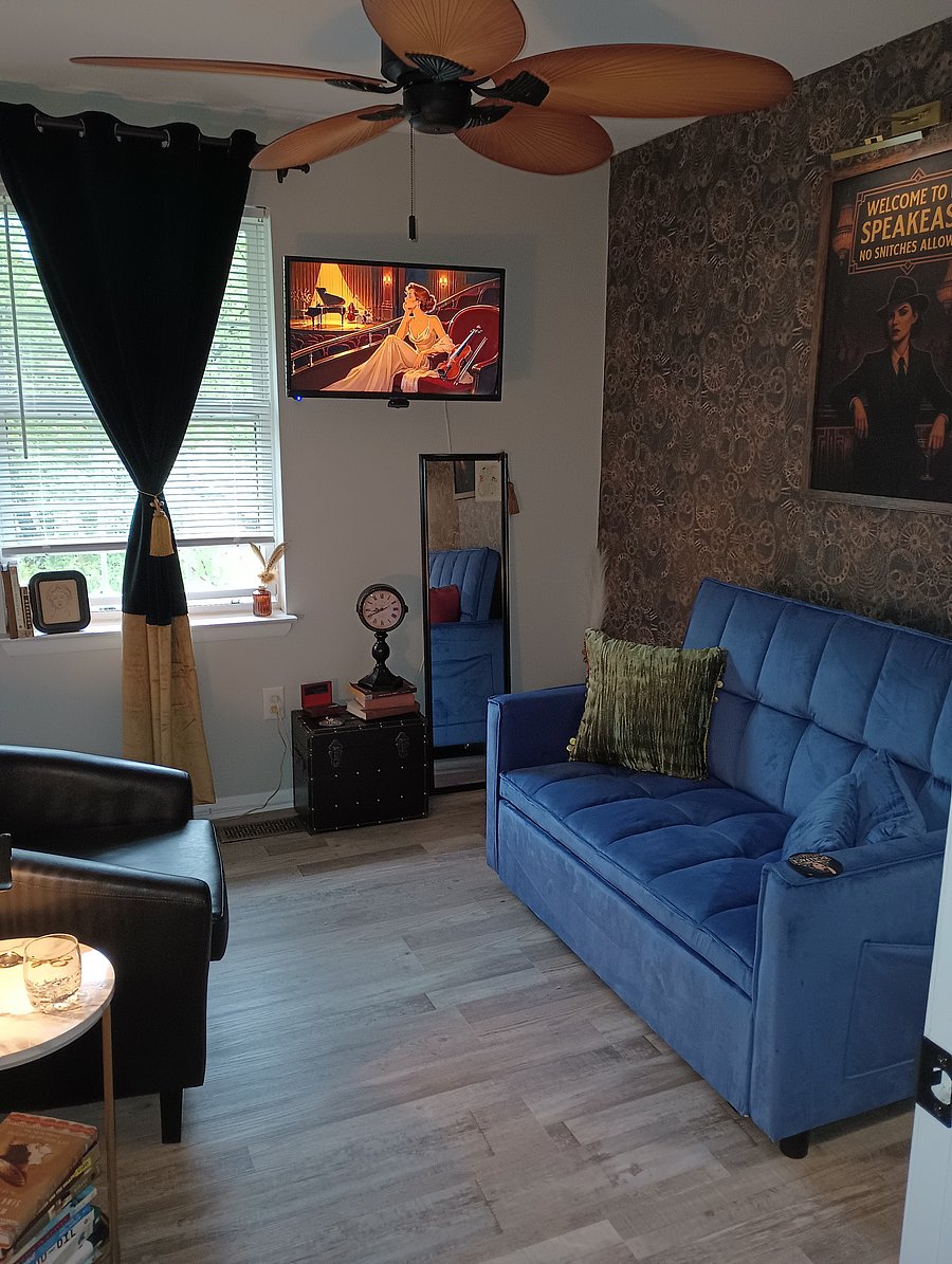 Your room with a speakeasy vibe! It has a double pullout sofa.