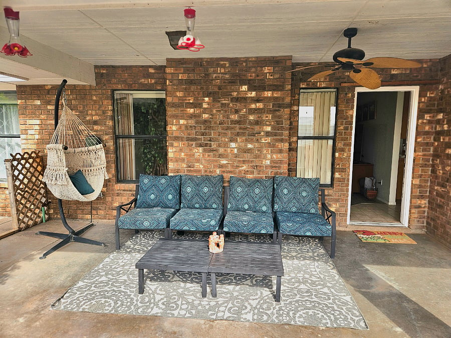Cozy back patio perfect for watching sunsets.