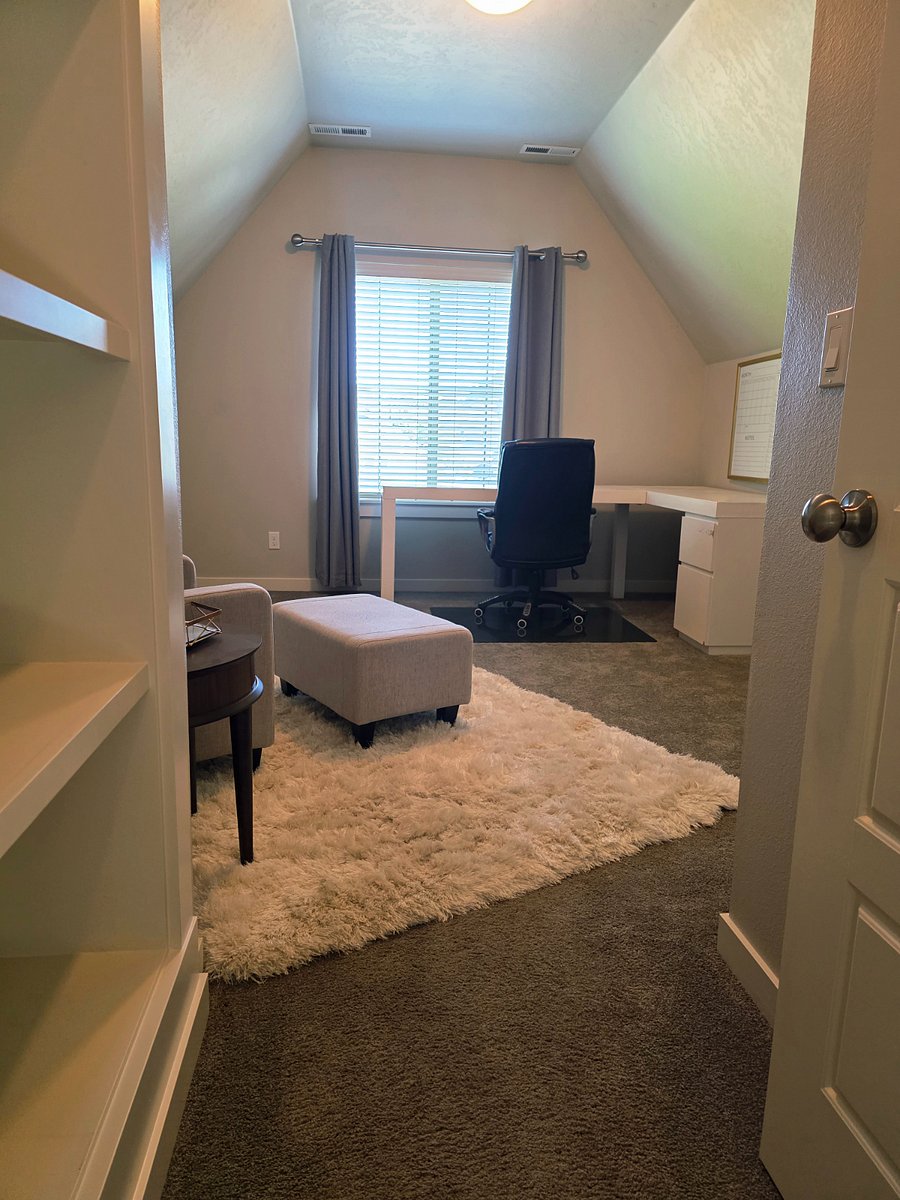 Upstairs office with a reading nook
