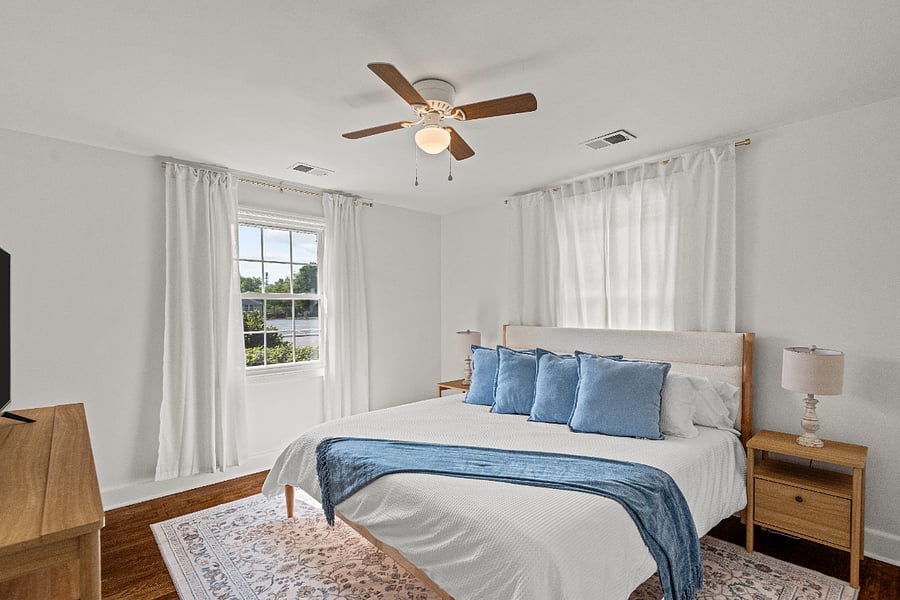 Primary bedroom with king bed and two closets