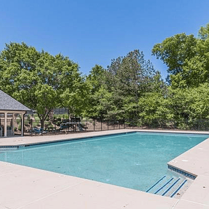 Access to quiet community pool and shaded seating areaperfect for unwinding after long shifts