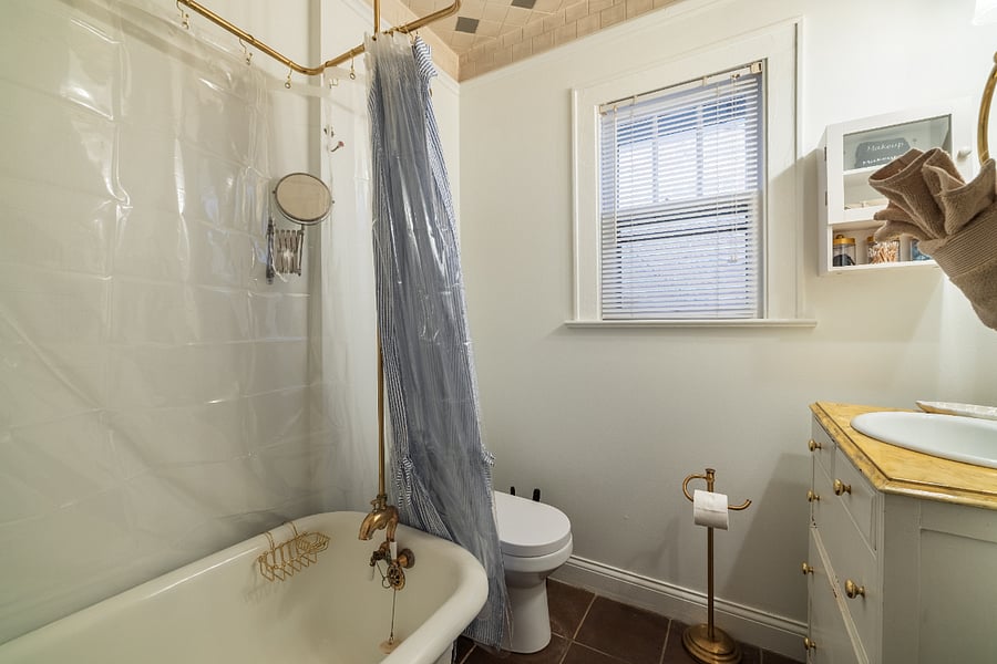 Full bathroom with claw foot tub/shower