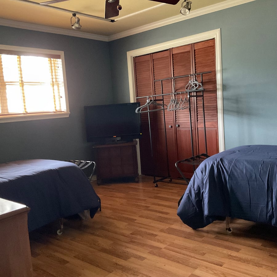 Bedroom #4, two single beds may be pushed together to make a queen bed with plush topper for one person. 