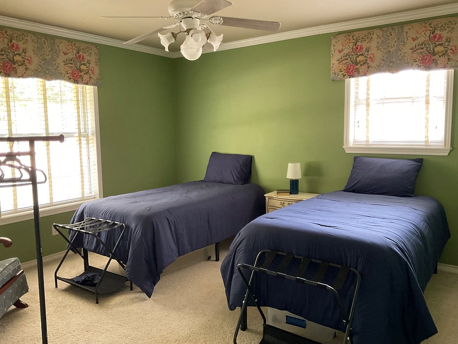 Bedroom #3, two single beds may be pushed together to make a queen bed with plush topper for one person. 