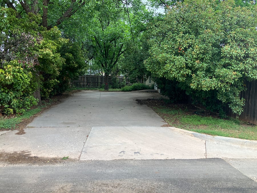 Back driveway off of alley. 