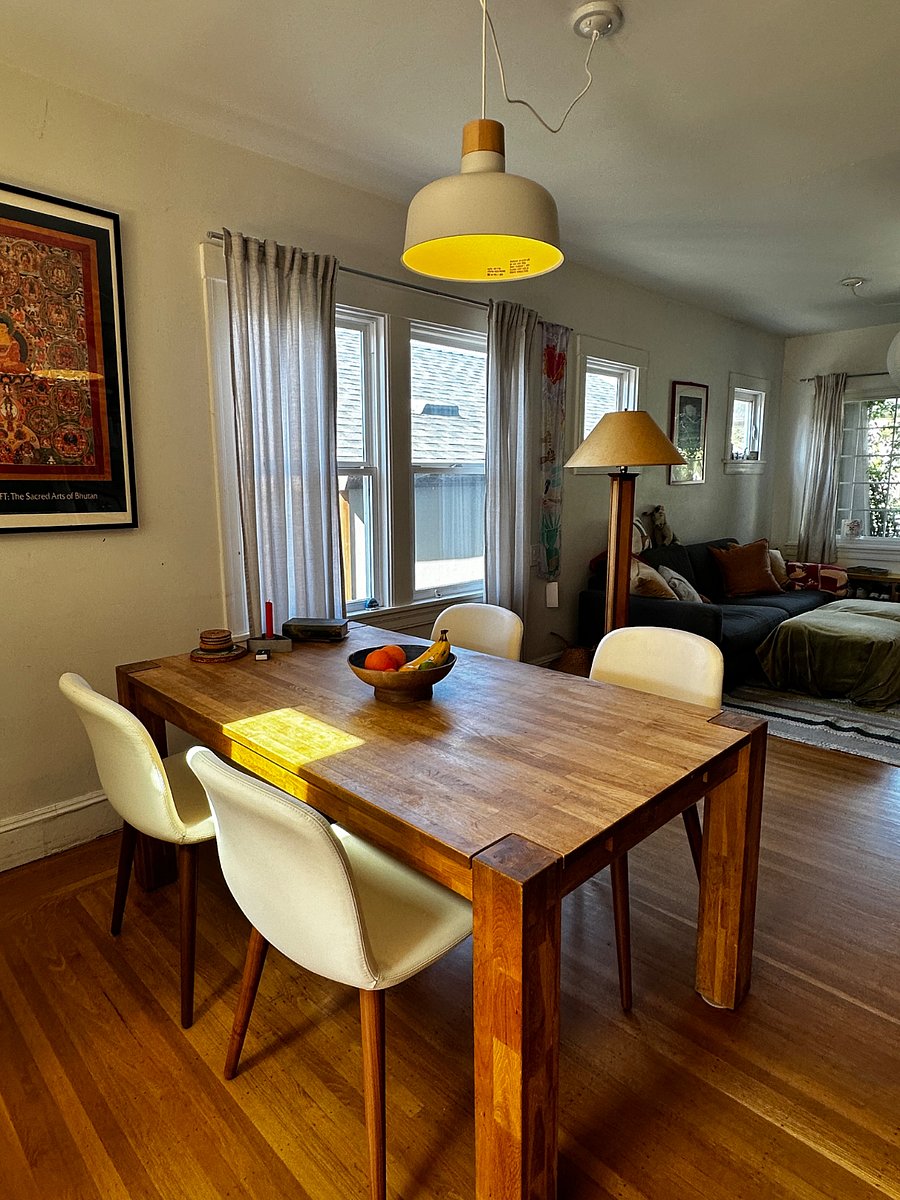 Dining room table extends and seats comfortable 8 people