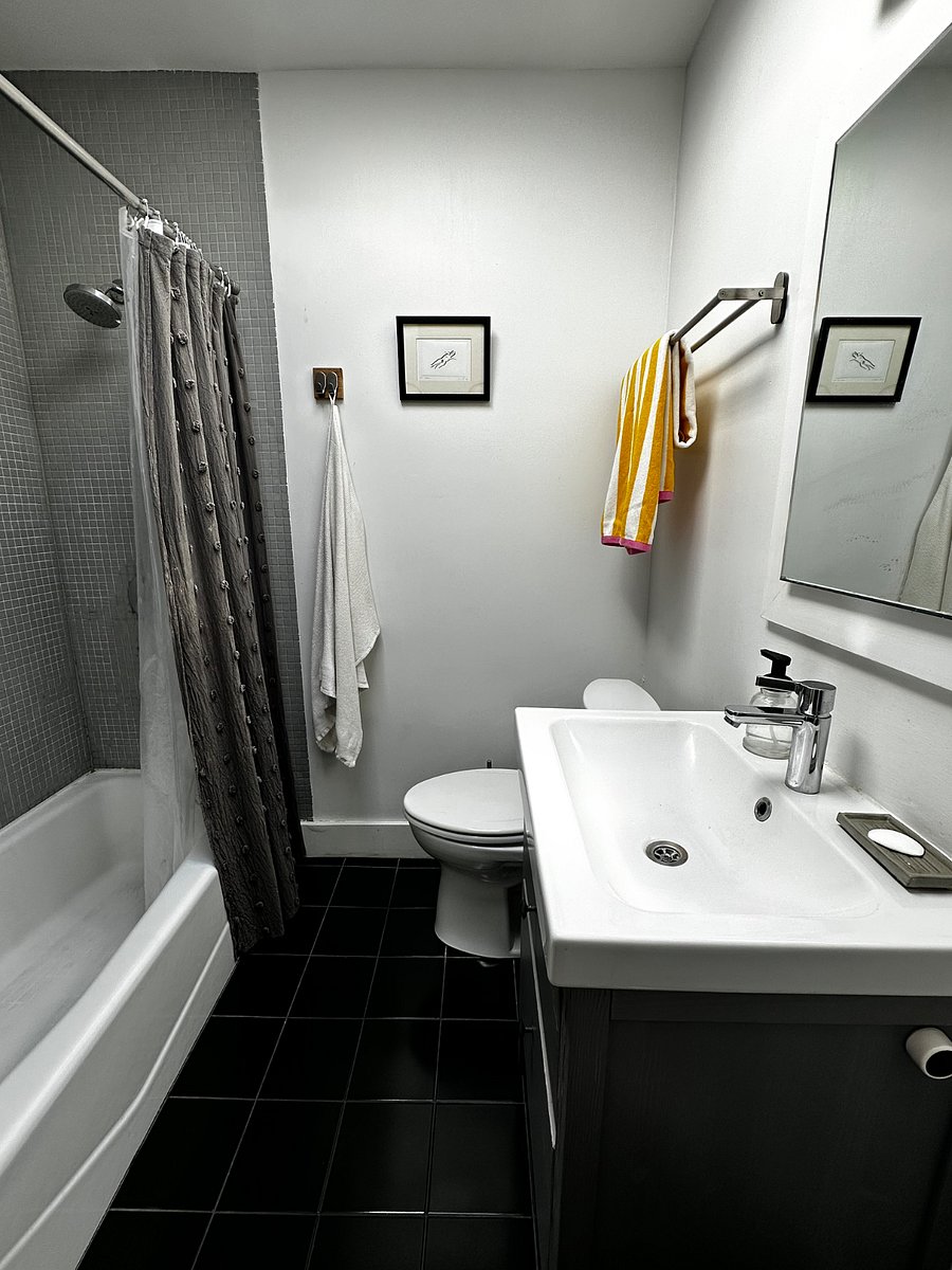 Bathroom with heated floors, shower and bath tub