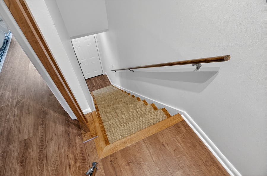 Two-story condo. Both bedrooms and full bathroom are on the second floor.