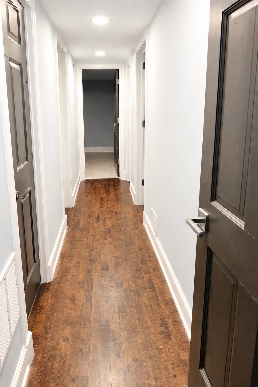 Hallway to bathroom and bedrooms