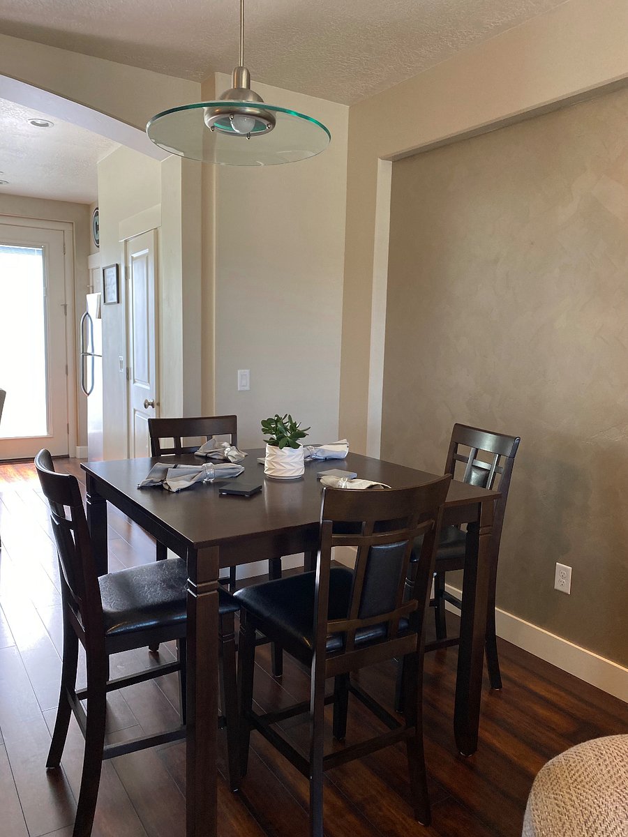 Dining table for 4 and 2 bars stools at island for more seating