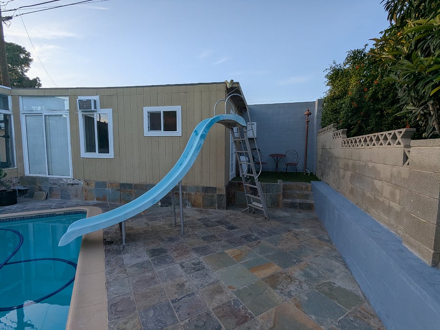 Pool area with view from the Studio window and patio.