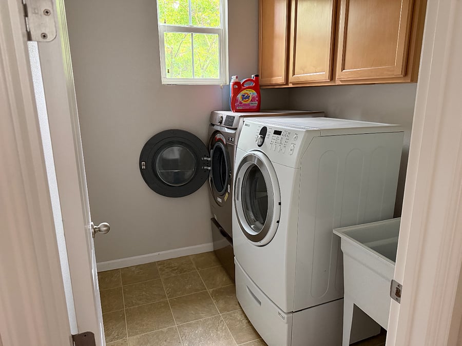 Big, new washer and dryer, and large scrub sink. Clothing hangar, too, for hand-washables or outside drying.