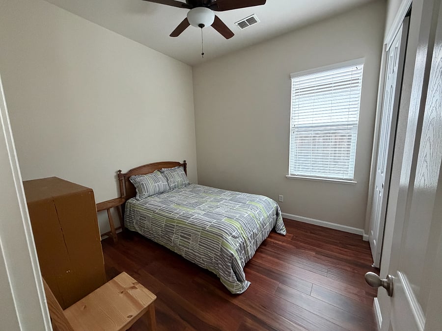 The second bedroom has a slightly smaller bed but is one step closer to the bathroom! Full-size bed, dresser, and chair. Also $800/mo or $1500/mo for both rooms.