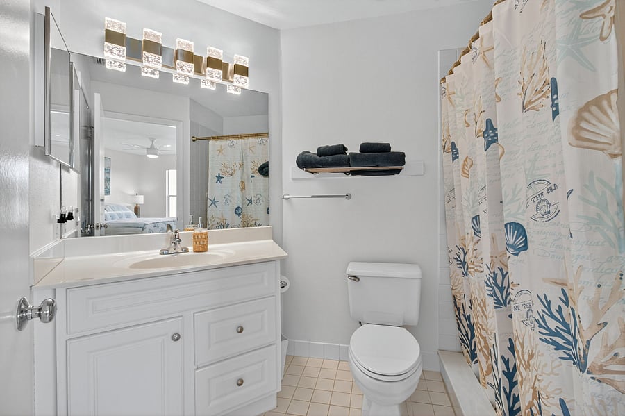 2nd bedroom bathroom with door to bedroom, and to hallway