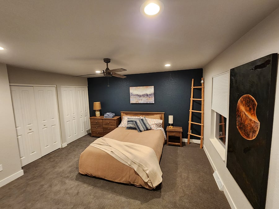 Primary Bedroom with two closets and queen bed