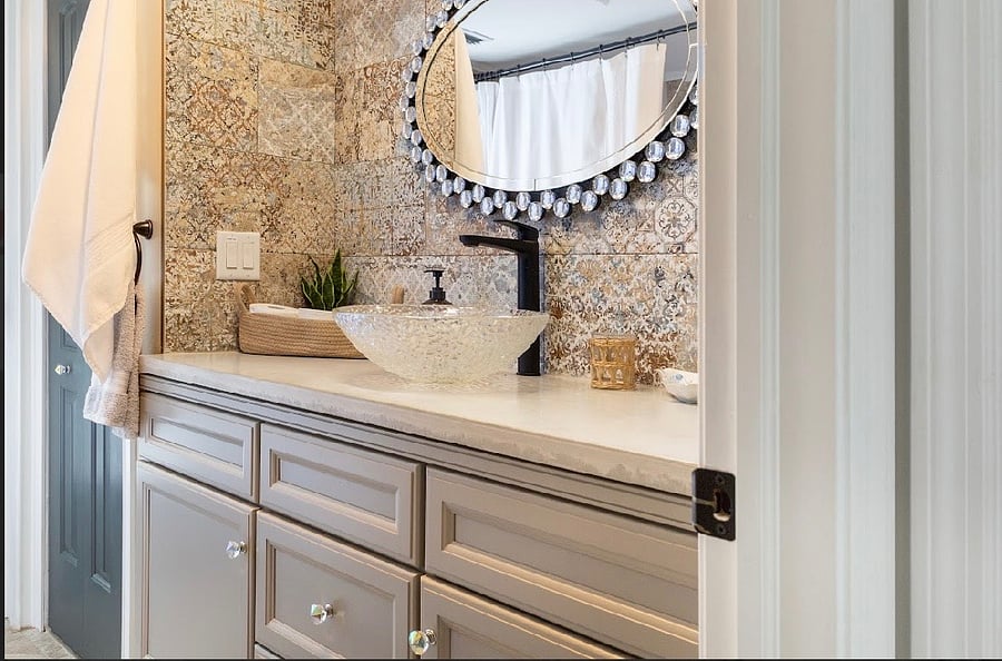 Full Guest Bathroom with Door to Pool
