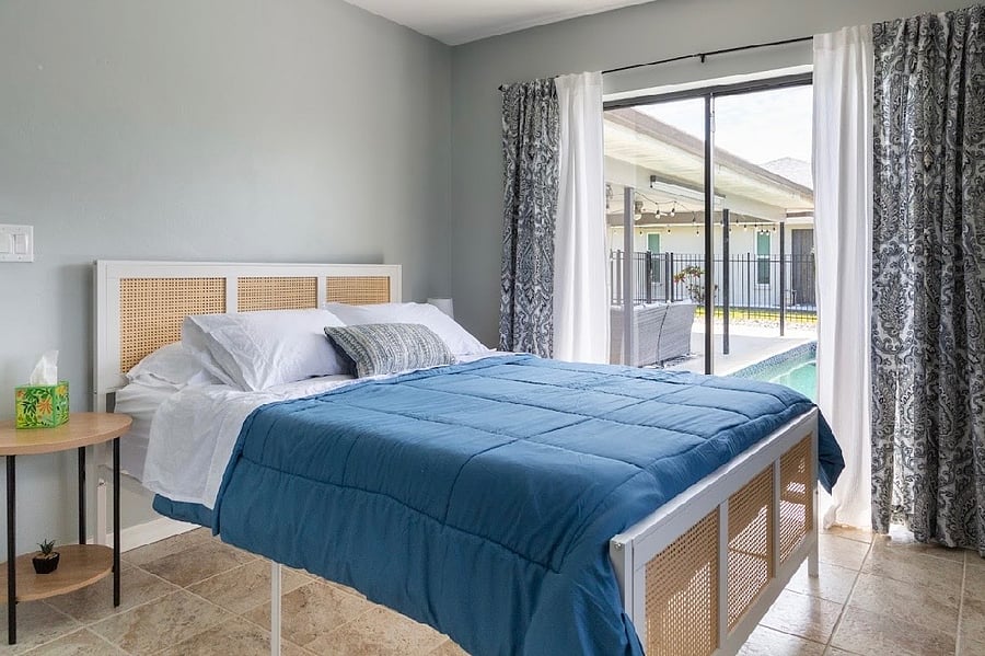 2nd Bedroom with New Sealy Queen Bed, Patio Door and Walk-In Closet
