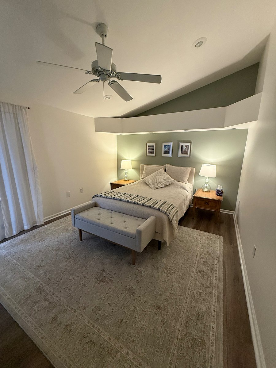 Primary bedroom with ensuite bathroom and walk-in closet