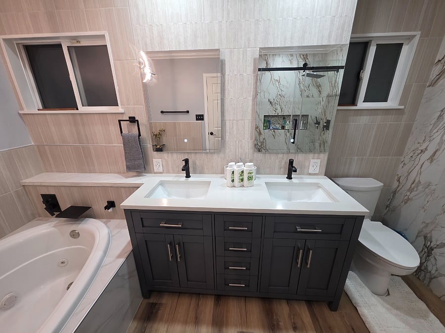 Enjoy a spa-like bathroom with a jacuzzi tub and double vanity in master bathroom.