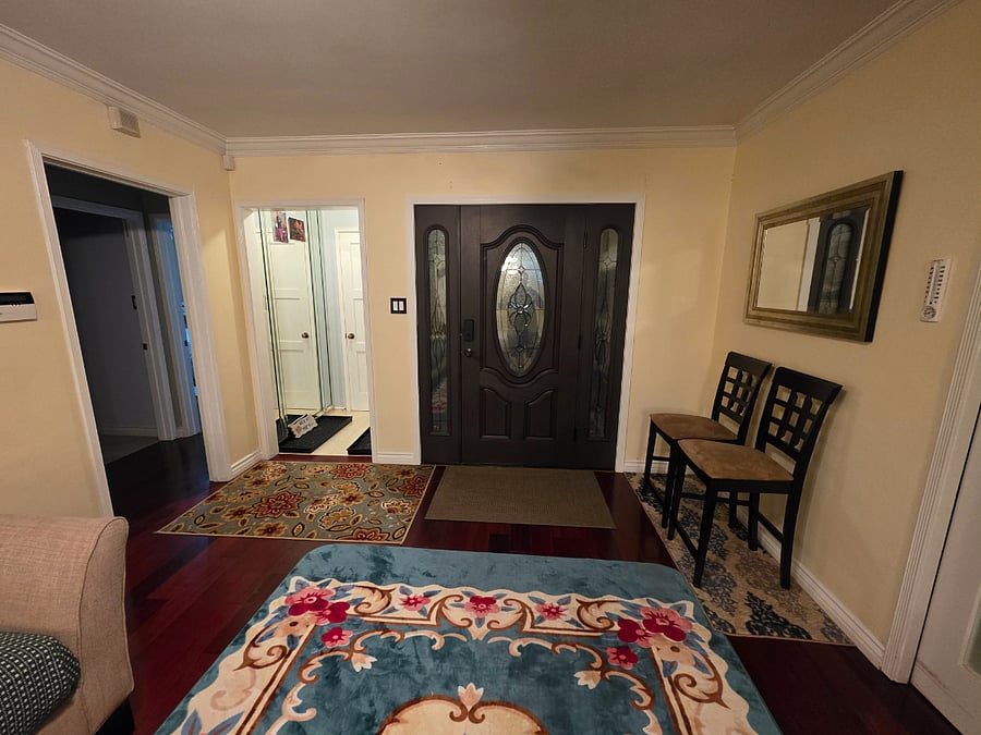 Looking at the front door from living room.