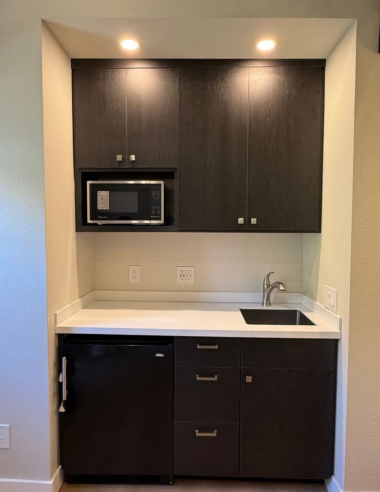 kitchenette includes - microwave, mid size fridge, convection hot plate, coffee maker 