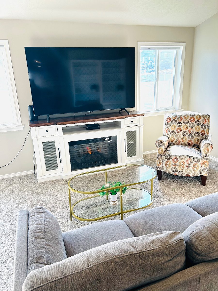 LED fireplace for a cozy ambiance with a very large big screen streaming tv. 75 inch.