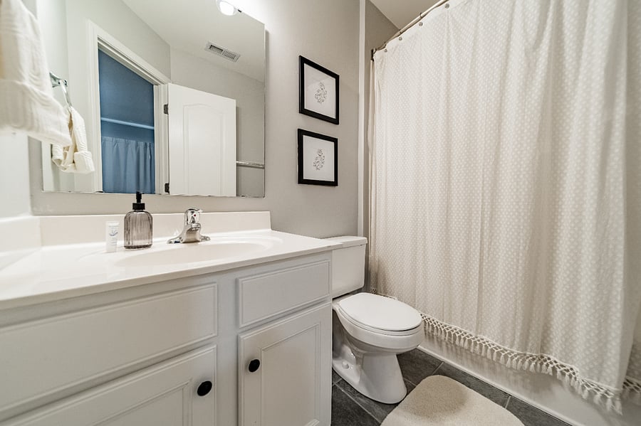 guest bathroom with tub