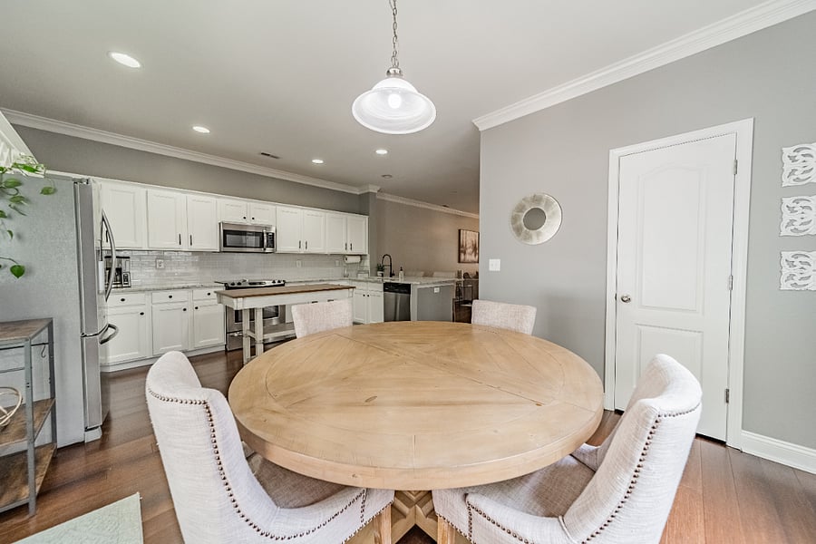 breakfast nook off kitchen with half bath