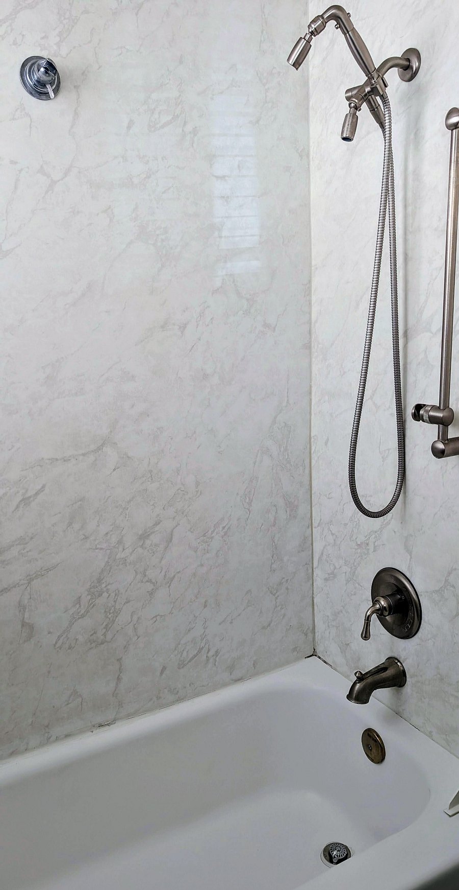 Bathroom with shower and tub.