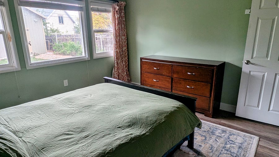 Primary bedroom (furnished with a queen bed).