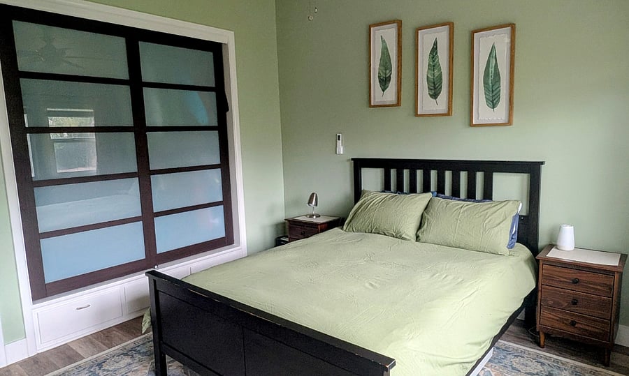 Primary bedroom (furnished with a queen bed).
