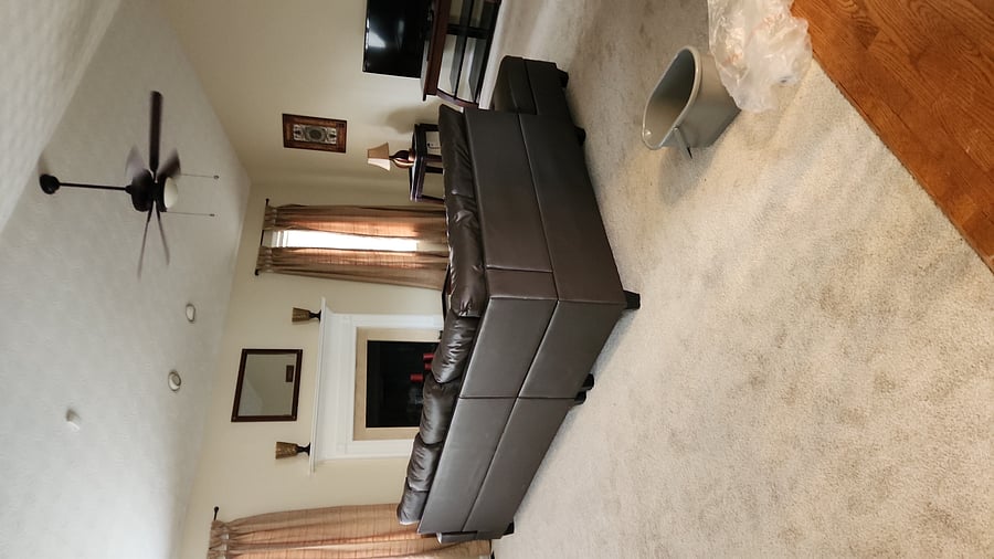 Living room with 75 inches TV and Bluetooth connection with speaker 