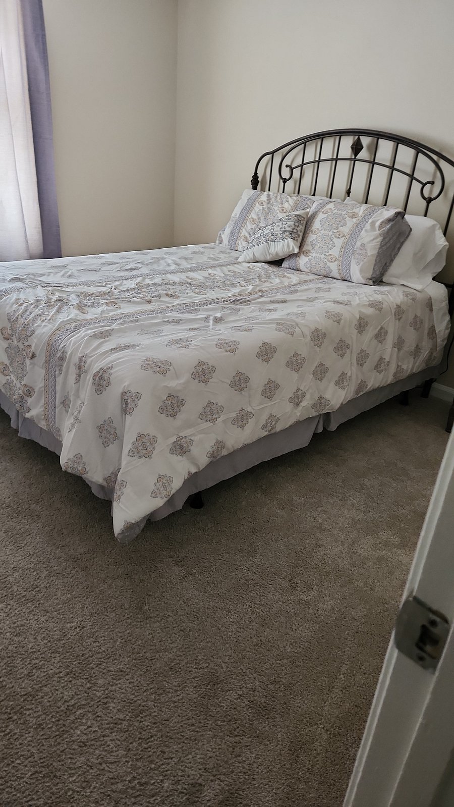 Third bedroom with full size bed set. 