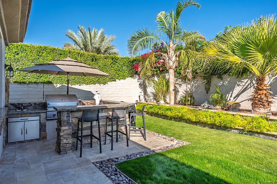 Outdoor Kitchen and BBQ and lawn.
