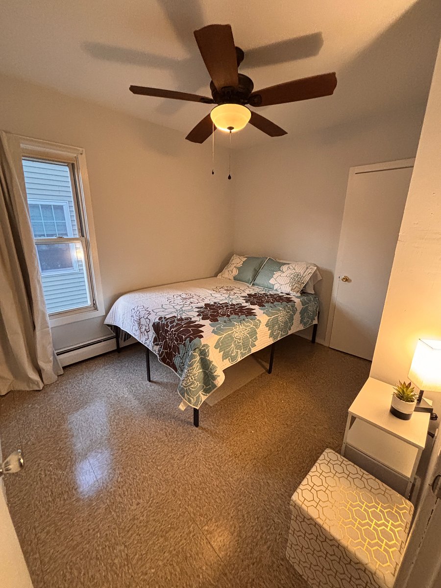 Main level bedroom, desk in room, black out curtains. Share bathroom with only one other tenant.  $950