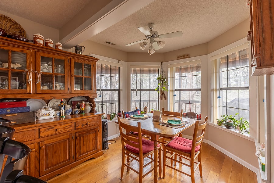 A favorite dining experience is the breakfast nook with windows on three sides. Perfect for enjoying a meal while watching the birds eating at the feeders. 