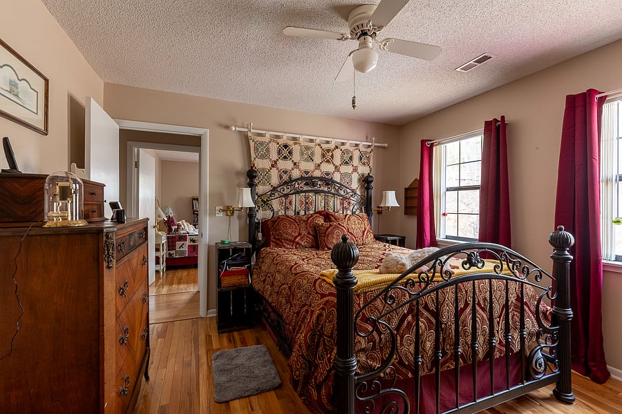 Master bedroom with a queen purple mattress bed so comfortable you will look forward to sleeping on it. Black out curtains and vertical blinds. 