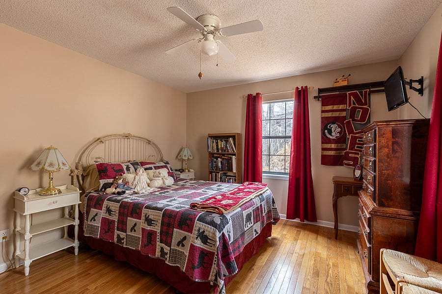 The second bedroom has a queen bed, blackout curtains, closet and two dressers. 