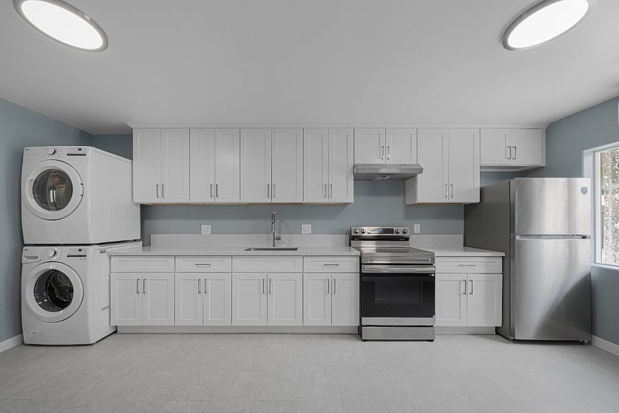 Unit # A
Kitchen with full-sized in-unit washer/dryer for your convenience